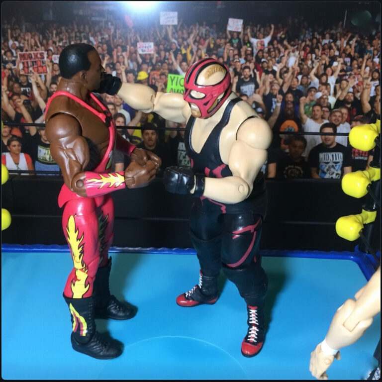 Big Van Vader in his iconic red mask and gear as WCW World Heavyweight Champion, strikes powerfully.