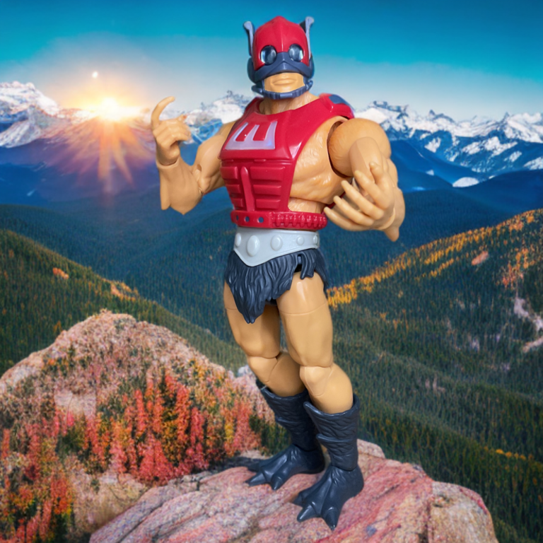 Masterverse New Eternia Zodac se tient sur une montagne au coucher du soleil.