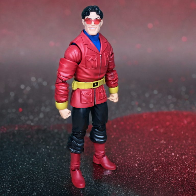 Wonder Man wearing his signature red jacket and red-tinted sunglasses, glowing with ionic energy.