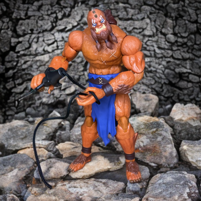 A full-body shot of the modern Beast Man action figure, highlighting the dynamic pose and overall menacing sculpt.