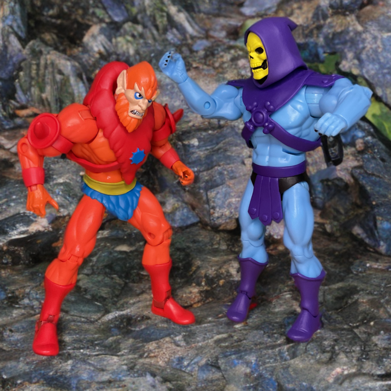 The Masters of the Universe Beast Man Classics action figure, wearing orange armor being scolded by Skeletor