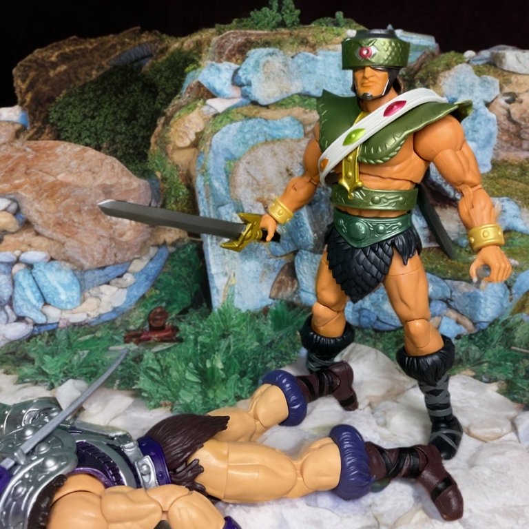 Tri-Klops stands triumphantly over a defeated Fisto.
