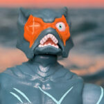 Featuring high-resolution photographs of the Mer-Man action figure, emphasizing the scars on his chest and face from battle.