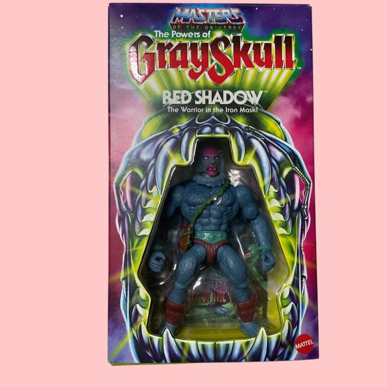 Product image of the Crimson Conspiracy Sentinel of He-Ros in his sealed collector's box with Powers of Grayskull logo visible.