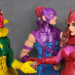 Wanda and The Vision extends their hands to each other highlighting their complicated romantic tension.