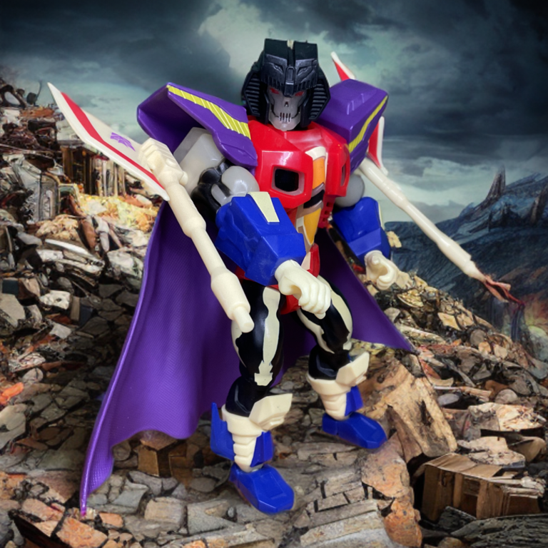 Starscream Armor Scare Glow holding two red-accented wing blasters attached to arms.