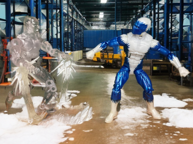 Epic clash of ice powers: Iceman and Blizzard facing off in a frozen warehouse environment, fan-style battle scene