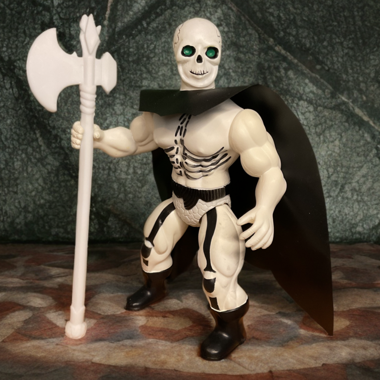 Figurine de chasseur de têtes Warrior Beasts avec accessoires de trophée et hache.