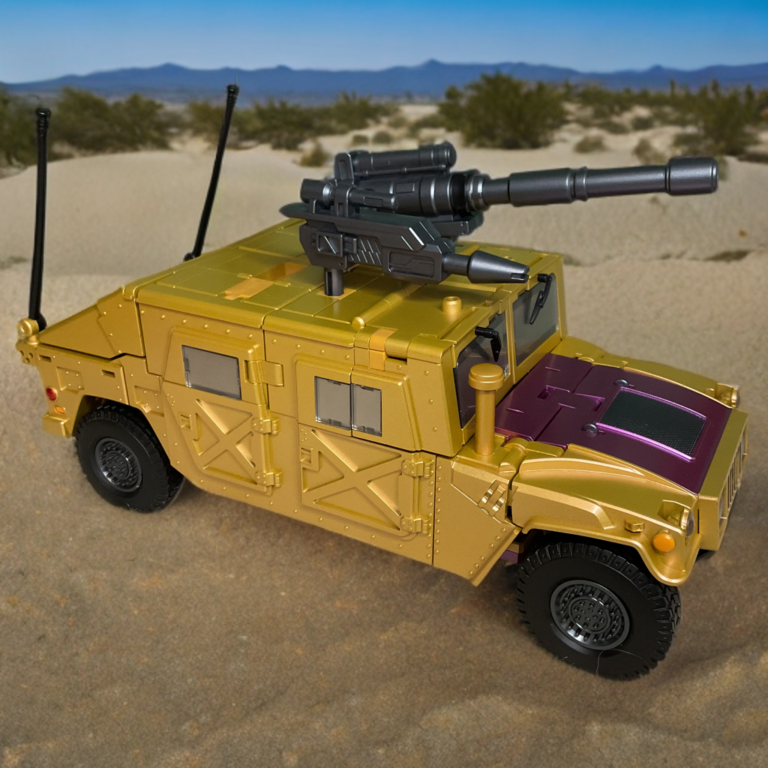 Zeta Toys Racket in jeep vehicle mode, tan Humvee-style body with black cannon turret on roof, antennas extended, and orange wheel accents on desert backdrop.
