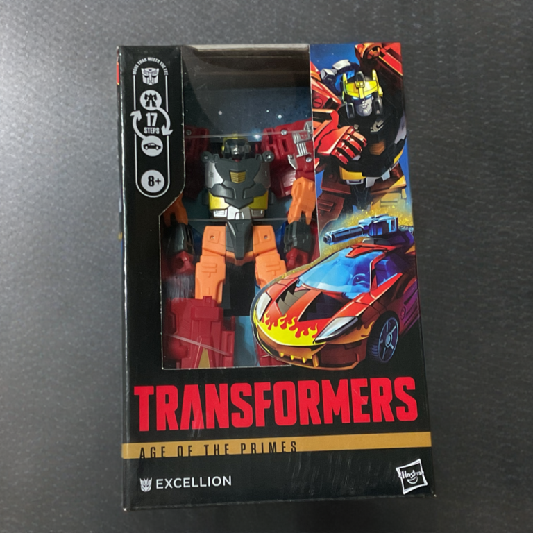 Transformers Age of the Primes Excellion Deluxe figure displayed in original window packaging box with flame-decaled sports car art and 17 STEPS graphic.