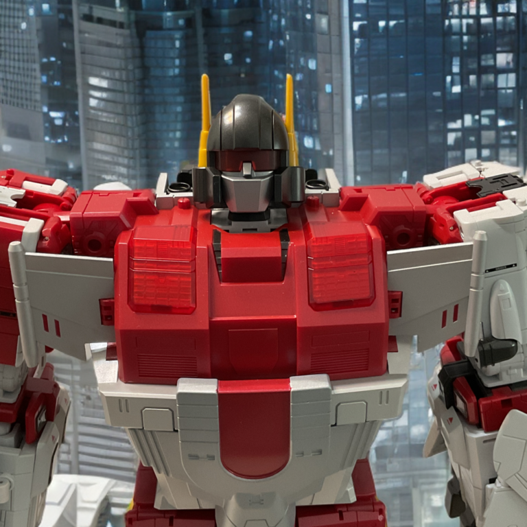 Detailed head and chest view of Zeta Superitron Metallic Edition combiner, light-piping eyes and premium metallic paint.