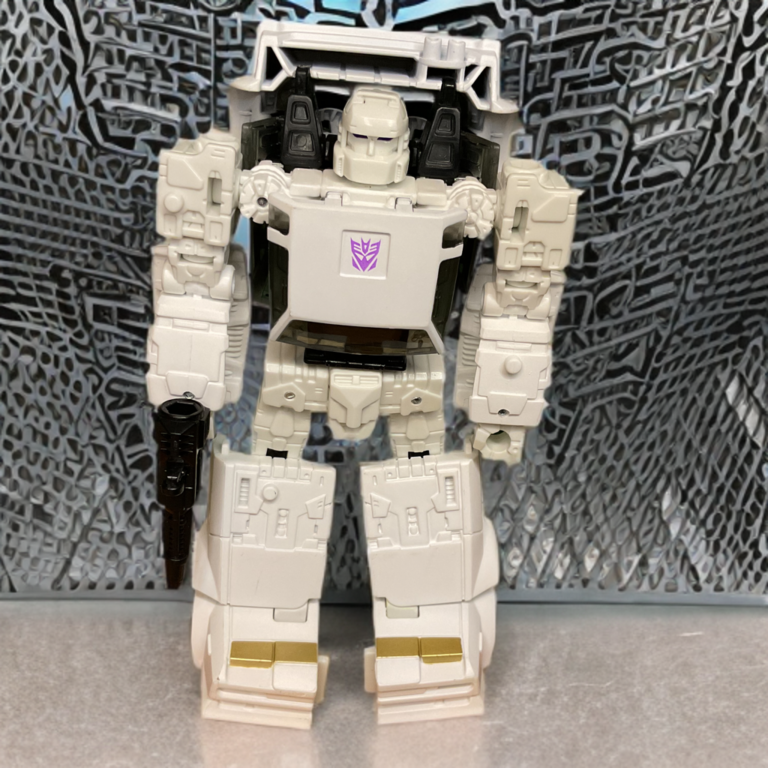 Detailed paint applications on Earthrise Runamuck's chest and limbs, crisp purple Decepticon symbol and metallic gold highlights.