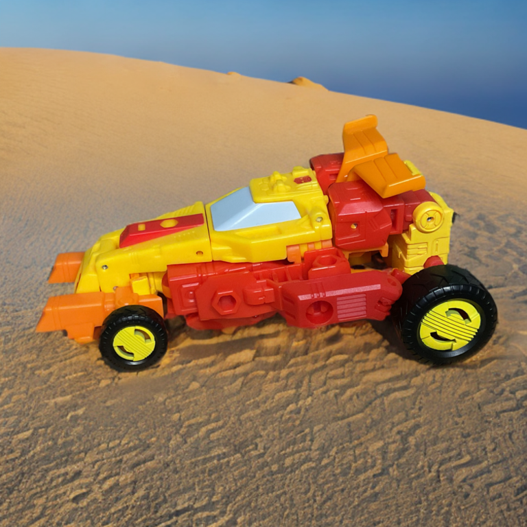 Close-up do cockpit do modo buggy de dunas Sureshot, capota translúcida, pontas de spoiler laranja e chassi detalhado.