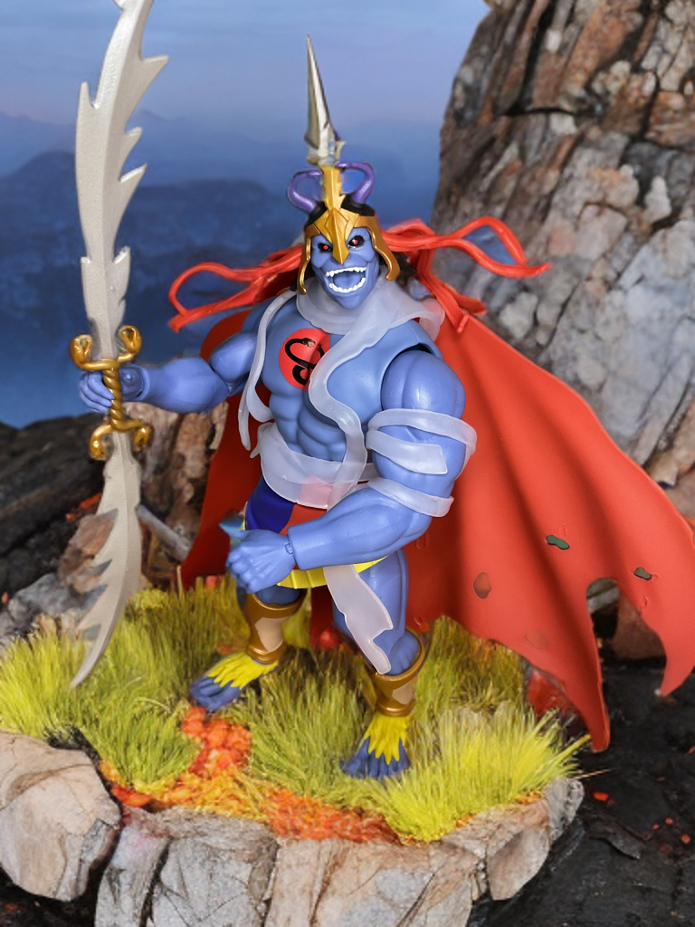 Mumm-Ra form in aggressive pose, red cape billowing on the Skell-Ra Origins figure.