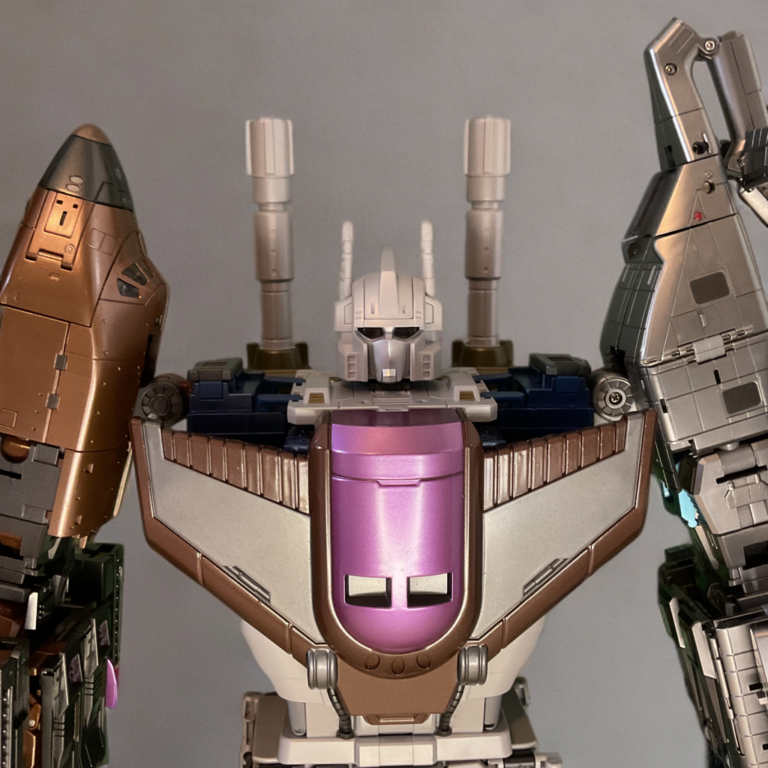 Close-up view of a large combiner robot's torso and head, emphasizing armor plating, joints, and facial details.