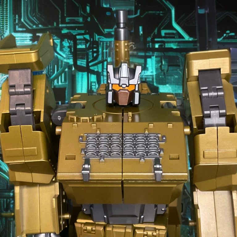 Close-up of Zeta Toys Brawl as green robot with yellow accents.