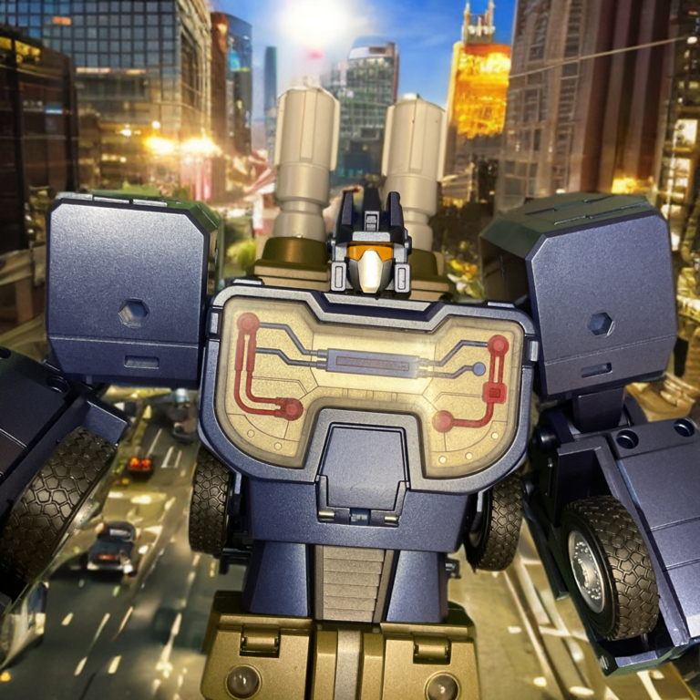 Close-up of Zeta Toys Onslaught with blue artillery colors standing in the street of a major city.