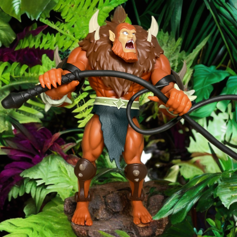 Close-up of removable flexible whip accessory included with Beast Man Cartoon Collection figure.