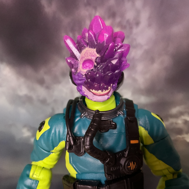 Detailed Dark Energon crystal growths on Cobra Mole Rat Stage 2 figure.