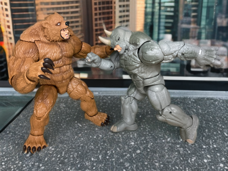 Marvel Legends Grizzly and Rhino action figures in an intense face-to-face power stance.