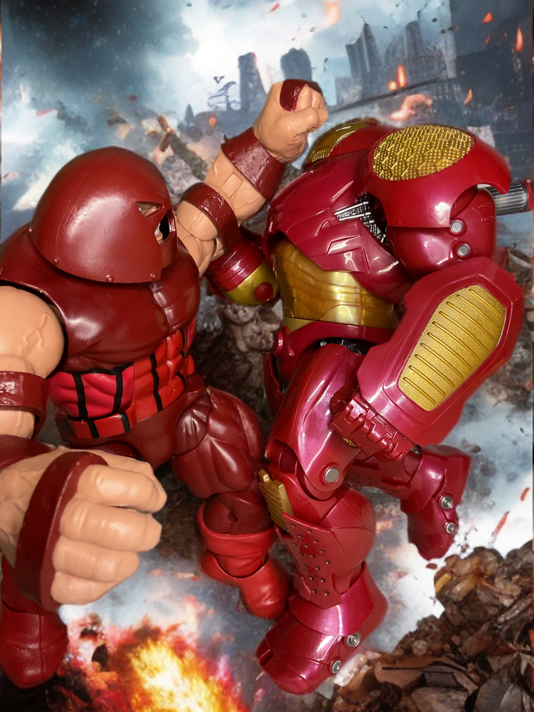 Juggernaut bulldozing into Hulkbuster armor in brutal Marvel-style brawl.