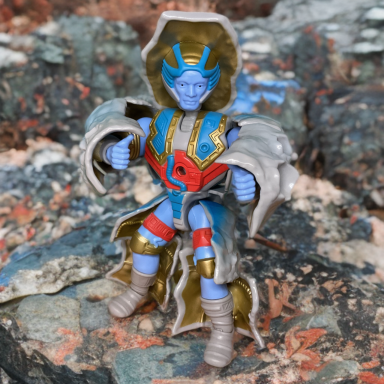 Figura Origins em pose dramática com os braços estendidos, destacando 16 pontos de articulação.