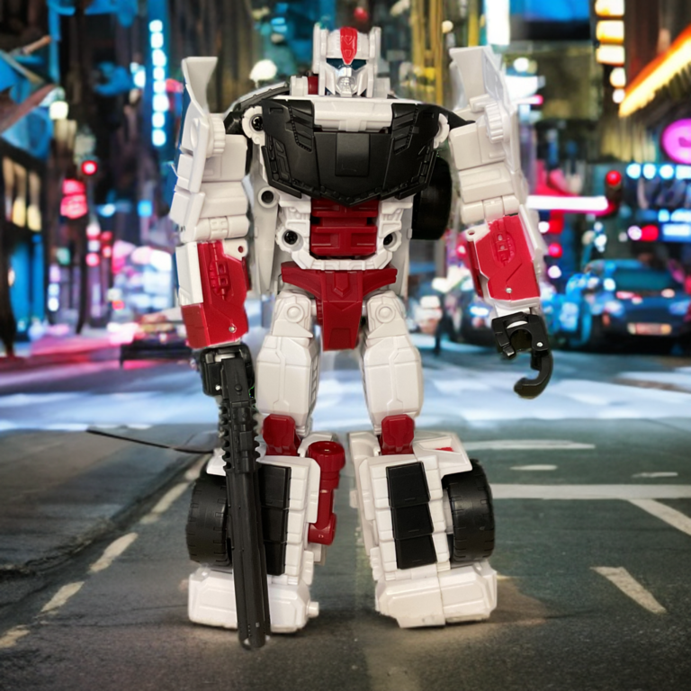 Streetwise robot mode, a white police car robot wielding a tactical shotgun-style weapon.