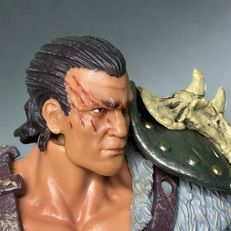 Krieger The Shunned unhelmeted head close-up with ponytail and scars, Fantasy Action Figures collection highlight.