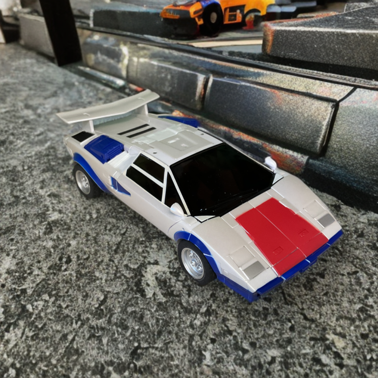 DX9 Attila Breakdown transforming into sports car mode.