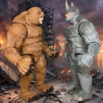 Marvel Legends Grizzly and Rhino action figures posed in a dramatic face-off on a collector’s shelf, representing two iconic Spider-Man brute villains in a head-to-head battle.