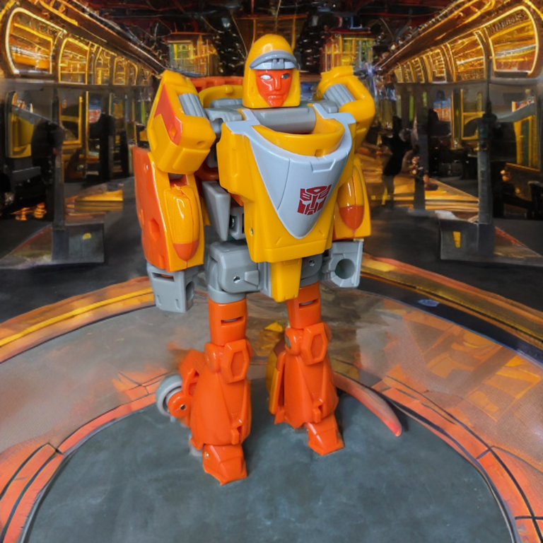 Transformers Retro G1 Autobot Wheelie in robot mode front pose, 4.5 inch Deluxe figure.