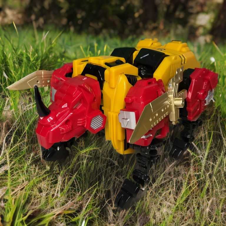 Headstrong (Fortis) rhino beast mode and robot mode from Jinbao Oversized Predaking, forming the right leg of the combiner.