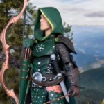 Mythic Legions Elf Ranger Xylona's Flock action figure review - vielseitiger Waldläufer mit Bogen, Schwert und grünem Umhang, der für den alten LJN Melf Peralay von Fantasy Action Figures einspringt.