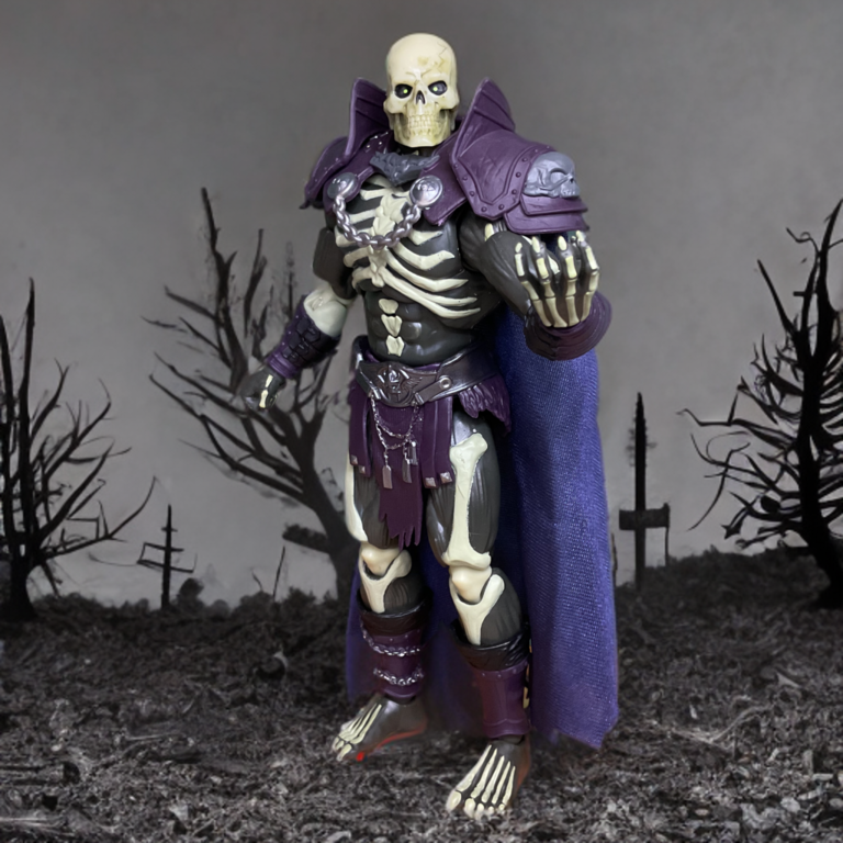 Detailed skull head of Scare Glow action figure from MOTU Chronicles, with eerie hollow eyes.