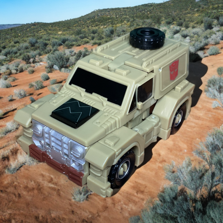 Khaki and tan color scheme of Outback highlighting off-road toughness.