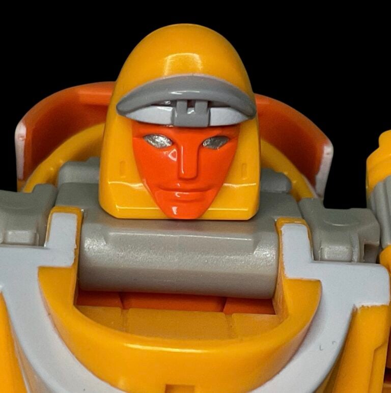 Close-up of Retro G1 Wheelie head sculpt and face.