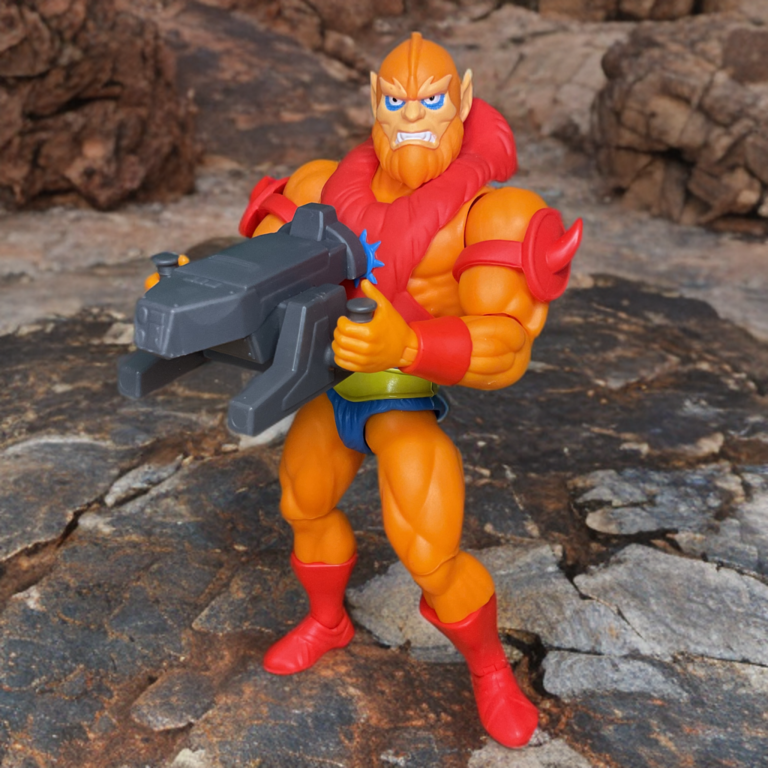 Close-up of the red spiked armbands on the Masters of the Universe Origins Beast Man toy.