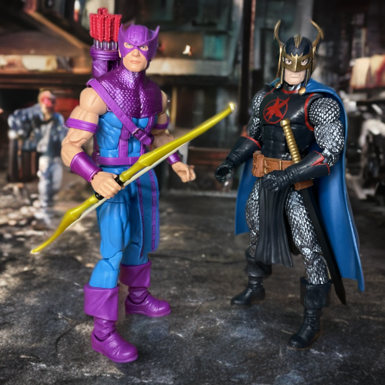 Black Knight Dane Whitman in enchanted armor action figure standing with Hawkeye.