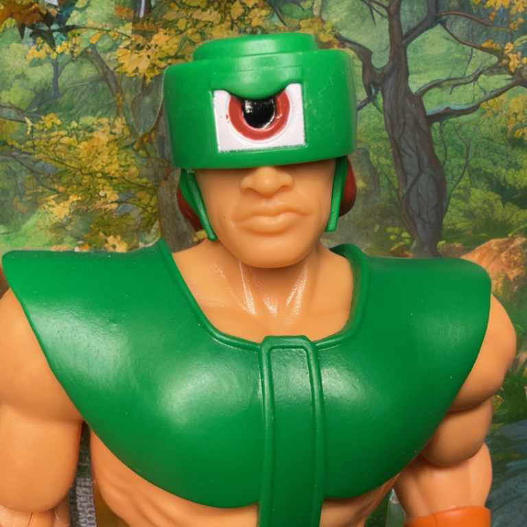 Close-up of the rotating three-eyed visor on the MOTU Origins Cartoon Collection Tri-Klops figure.