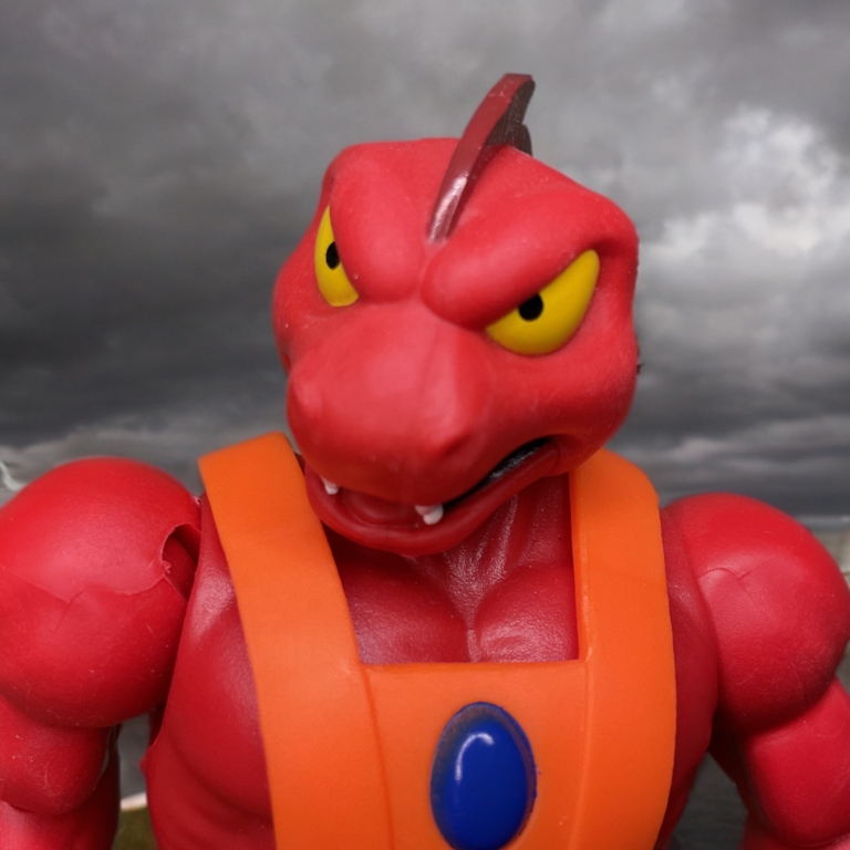 Detailed head sculpt and facial expression on Origins Clawful figure.