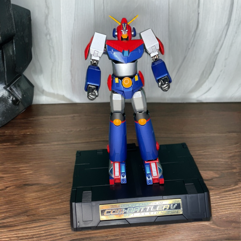 The die-cast Combattler V figure standing in a neutral position, showcasing its bold mechanical paint finishes and proportions.