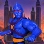 A cinematic close-up of the MOTU Origins Cartoon Collection Webstor action figure holding his orange grappling hook.