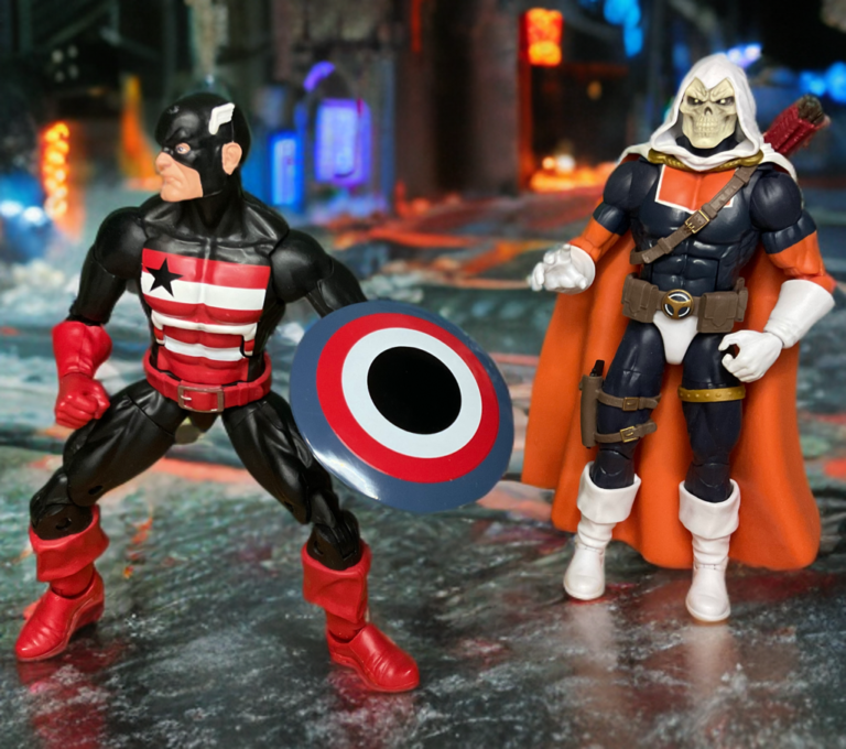 U.S. Agent action figure in full costume with Taskmaster action figure looking on approvingly, Fantasy Action Figures recreation.