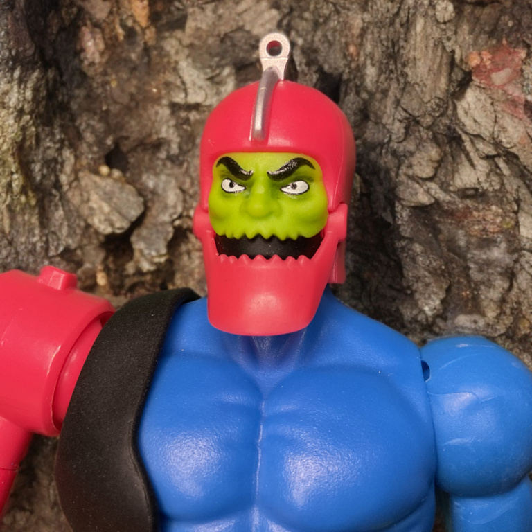 Detailed close-up of Trap Jaw’s metallic chomping jaw, MOTU Origins.