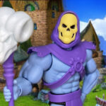 Close-up of MOTU Origins Cartoon Collection Skeletor action figure holding his Havoc Staff high in a commanding, villainous pose.