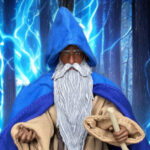 Mythic Legions Samir Scrollwarder action figure standing in a majestic pose with a layered fabric cloak.