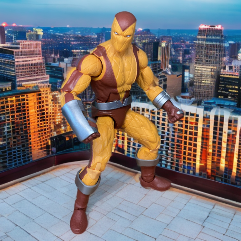Shocker action figure positioned on a rooftop overlooking the city, preparing to use his vibro-shock gauntlets as part of the Insidious Six in Spider-Man: The Animated Series.