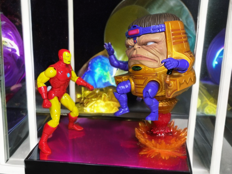 M.O.D.O.K. clashing with Iron Man across multiple comic eras.