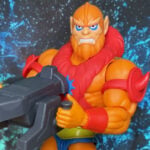 Close-up of MOTU Origins Cartoon Collection Beast Man action figure holding his accessory in a fierce, savage pose.