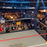 Fantasy action figures of Greg Valentine and Hulk Hogan locked in intense battle in the ring, capturing the historic clean Figure-Four submission victory.